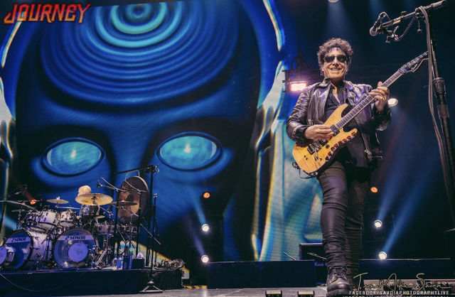 Neal Schon American Guitarist Playing at Journey Concert Large Robot head Variety of Images